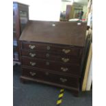 GEORGIAN MAHOGANY WRITING BUREAU WITH FITTED INTERIOR & 4 LONG DRAWERS WITH BRASS DROP HANDLES &