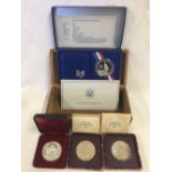 OAK BOX WITH 2 FESTIVAL OF BRITAIN CROWNS & A CANADIAN SILVER DOLLAR & 1986 LIBERTY SILVER DOLLAR