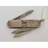 A SMALL MANICURE POCKET KNIFE WITH HALLMARKED SCALES,