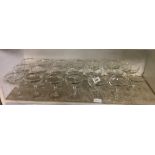 SHELF OF 20 VINTAGE CHAMPAGNE GLASSES