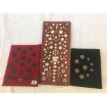 3 PLUSH VELVET DISPLAY BOARD OF 19 PATTERNED JET BUTTONS, 9 BRASS BUTTONS & NUMEROUS M.O.