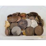 A TUB OF MOSTLY FOREIGN COINS