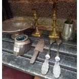 SHELF WITH BRASS CANDLESTICKS, PLATED SPOONS,