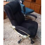 UPHOLSTERED OFFICE SWIVEL CHAIR WITH ARMS