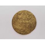 AN EGYPTIAN YR78 BELIEVED TO BE GOLD COIN