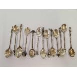 BAG OF SOUVENIR SPOONS WITH FANCY FINIAL'S,