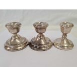 THREE WEIGHTED SILVER DWARF CANDLESTICKS, TWO MATCHING H/M B'HAM 1970, THE OTHER B'HAM 1974, 367.