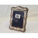SILVER PICTURE FRAME 5 ½” BY 4” H/M SHEFFIELD 1997, TOTAL WEIGHT 130.