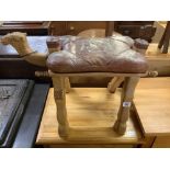 EGYPTIAN CARVED WOODEN CAMEL STOOL WITH DECORATED LEATHER UPHOLSTERED SEAT