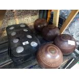 SET OF BOULE'S IN CARRIER & 4 BROWN LAWN BOWLS