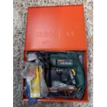 BOSCH POWER DRILL WITH MISC DRILL BITS IN RED METAL CASE