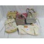 7 SMALL LIGHT COLOURED HANDBAGS IN NEW CONDITION, SOME WITH LABELS,