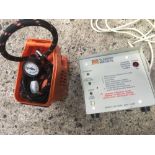 SMALL AIR COMPRESSOR & A SUNRISE MEDICAL BATTERY CHARGER