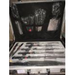 A CHEFS KNIFE SET IN CARRY CASE