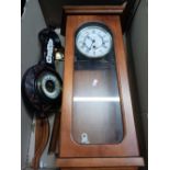 CARTON CONTAINING A WALL CLOCK WITH WESTMINSTER CHIME,