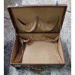 BROWN LEATHER SUITCASE