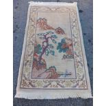 FLORAL PATTERNED WOOLLEN RUG 7ft 2" X 4ft APPROX & ANOTHER SMALLER WOOLLEN RUG