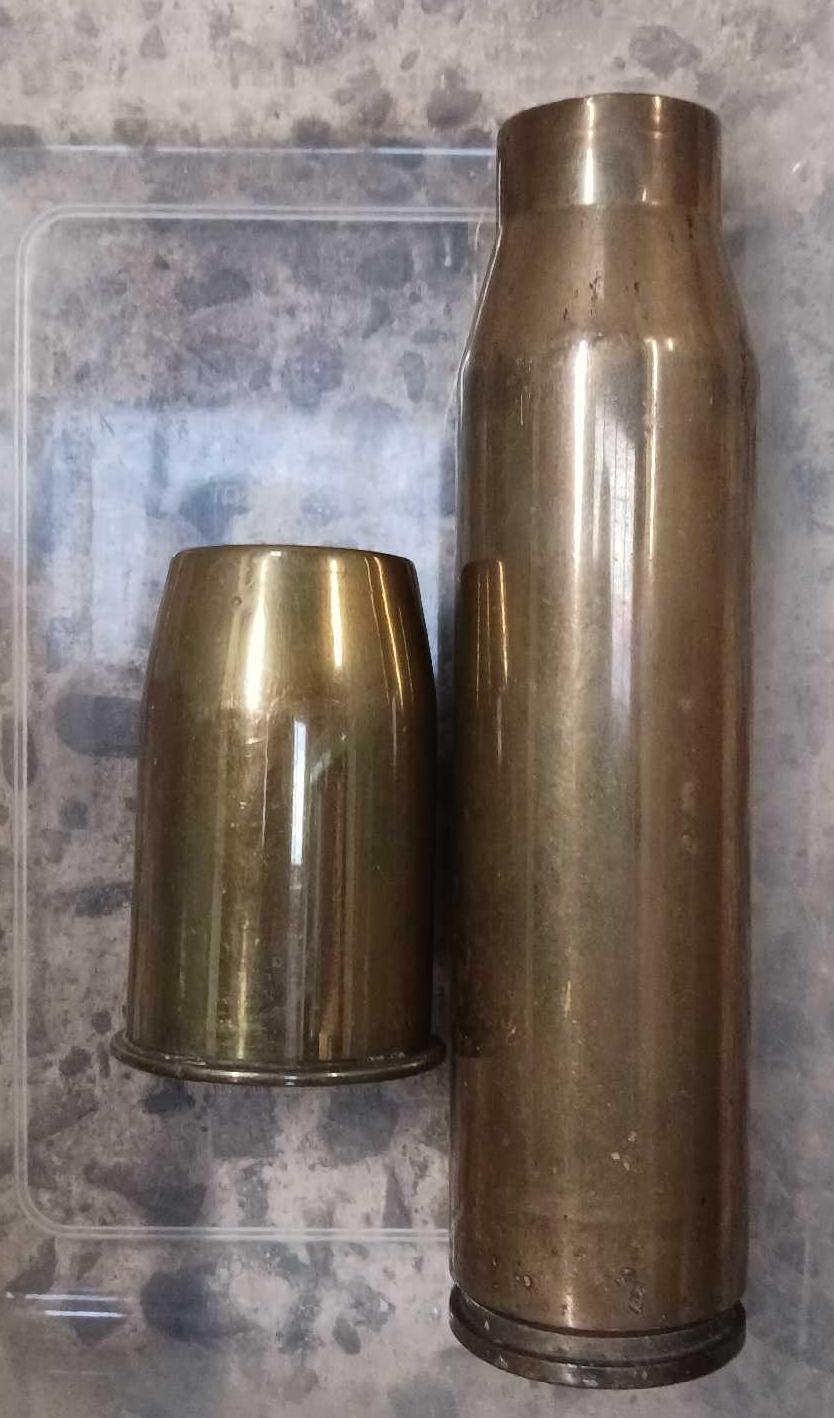 2 MILITARY SHELL CASINGS