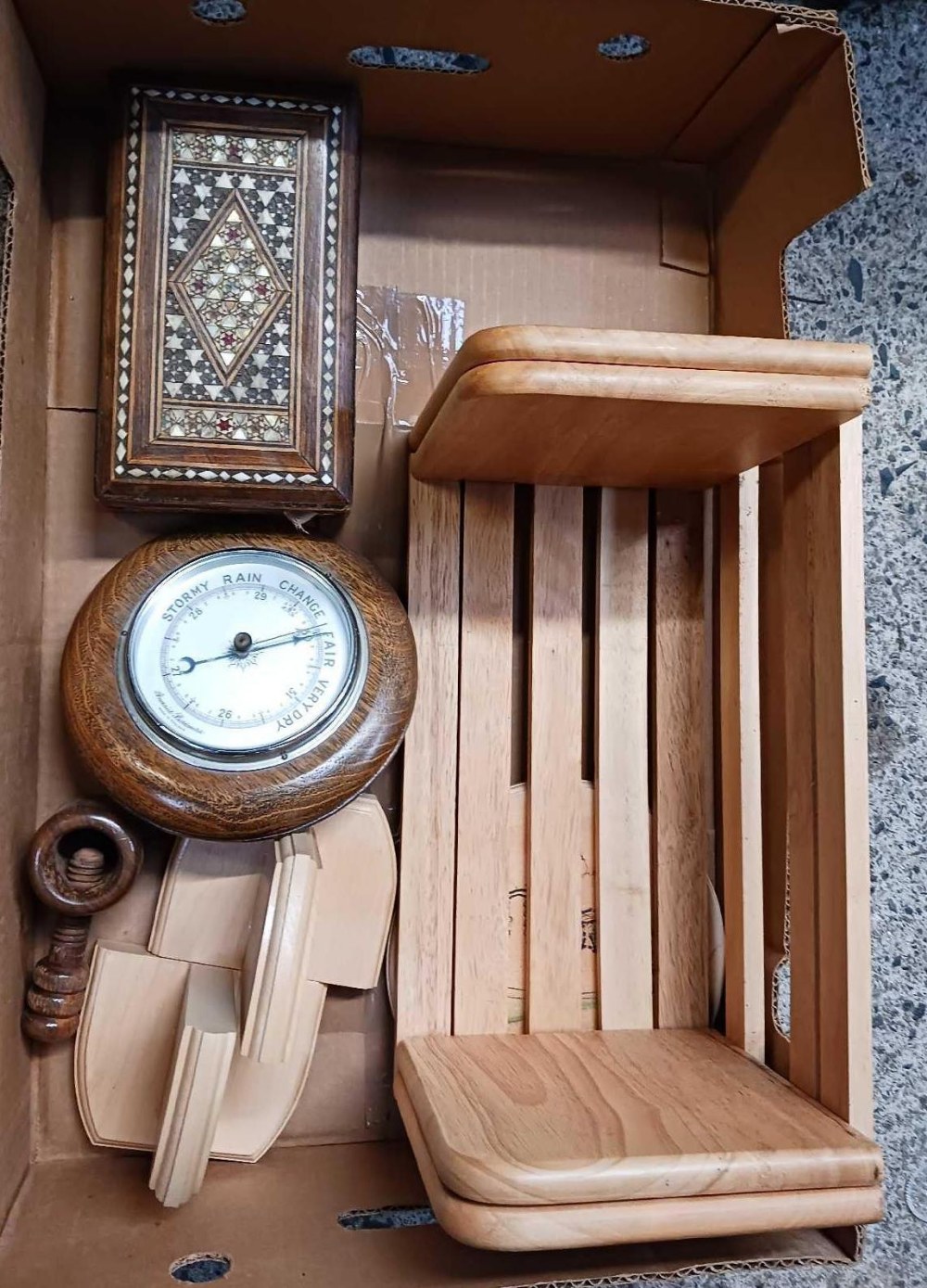 CARTON WITH SLIDING ADJUSTABLE BOOKSHELF, AN ANEROID BAROMETER, BOOKENDS, NUT CRACKER & M.O.