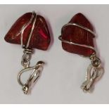 A PAIR OF CLIP ON AMBER EARRINGS