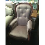 LATE VICTORIAN MAHOGANY BUTTON BACK ARMCHAIR ON ORIGINAL CASTERS