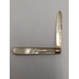 SILVER BLADED POCKET KNIFE WITH M.O.