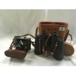 PAIR OF CASED BINOCULARS AND A CASED VINTAGE ZEISS CAMERA