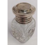 A SILVER MOUNTED SCENT BOTTLE,