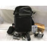 LARGE LOWPRO PHOTOGRAPHERS RUCK SACK WITH 35MM OLYMPUS TRIP, CANON BATTERIES,