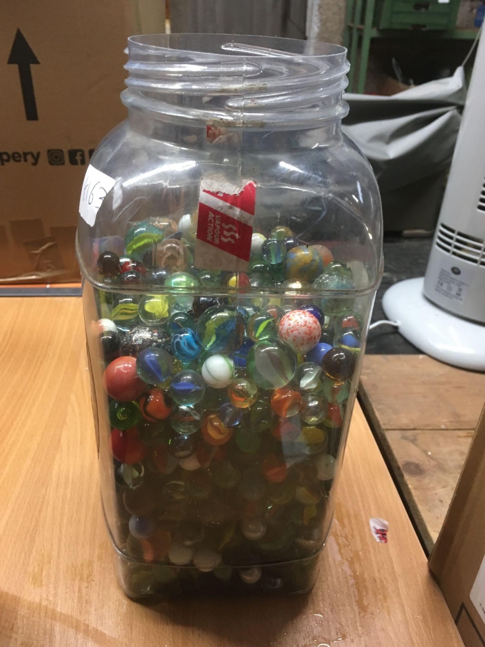 JAR OF MISC GLASS MARBLES