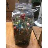 JAR OF MISC GLASS MARBLES