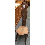 HIGH BACKED HEAVILY CARVED WOODED SPINNING CHAIR