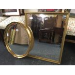 OVAL GILT FRAMED MIRROR & A RECTANGULAR GILT FRAMED MIRROR