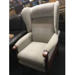 WOOD FRAMED & UPHOLSTERED WING BACK ARMCHAIR