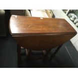 OAK DROP LEAF GATE LEG TABLE WITH BARLEY TWIST FEATURES