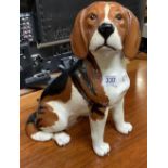 CHINA MODEL FIGURE OF A SEATED BEAGLE DOG