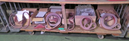 Various sized abrasive sanding belts