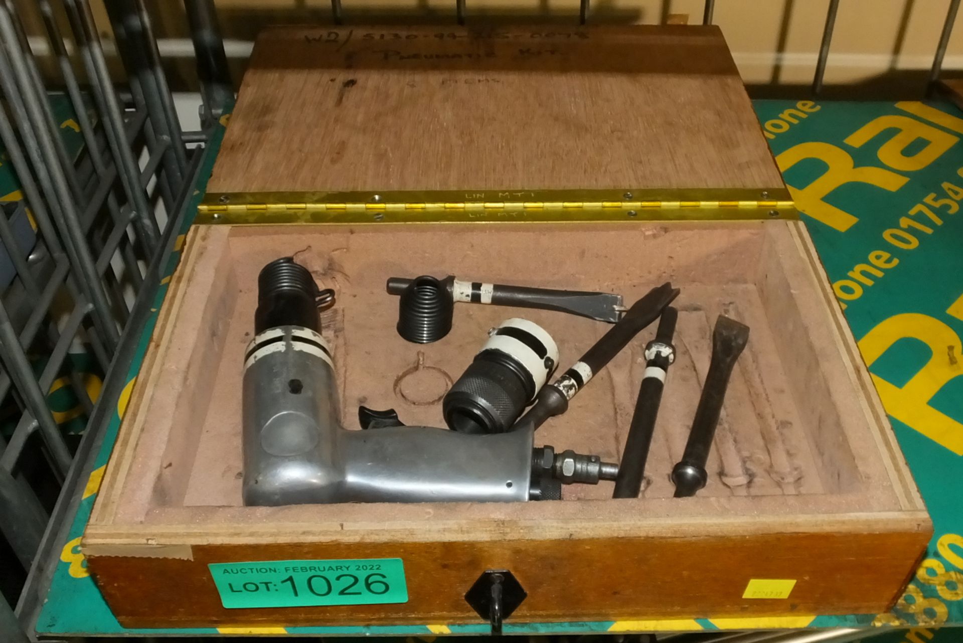 Pneumatic Hammer Tool In A Wooden Box