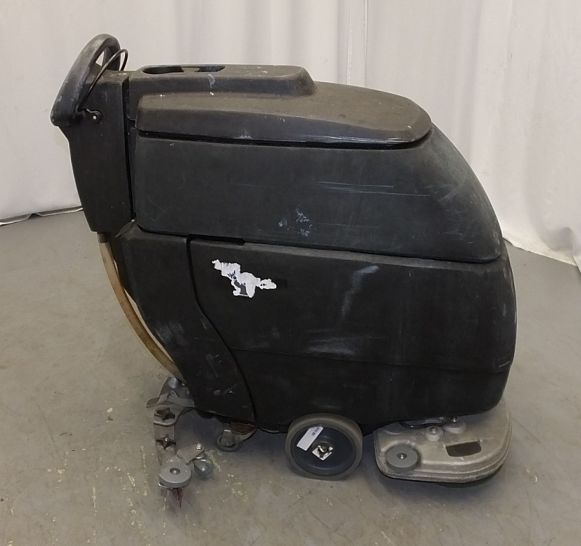 Tennant T3 Floor Scrubber - comes with key, starts and runs, cleaning functionality untested