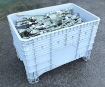 Tensioner bars in storage bin