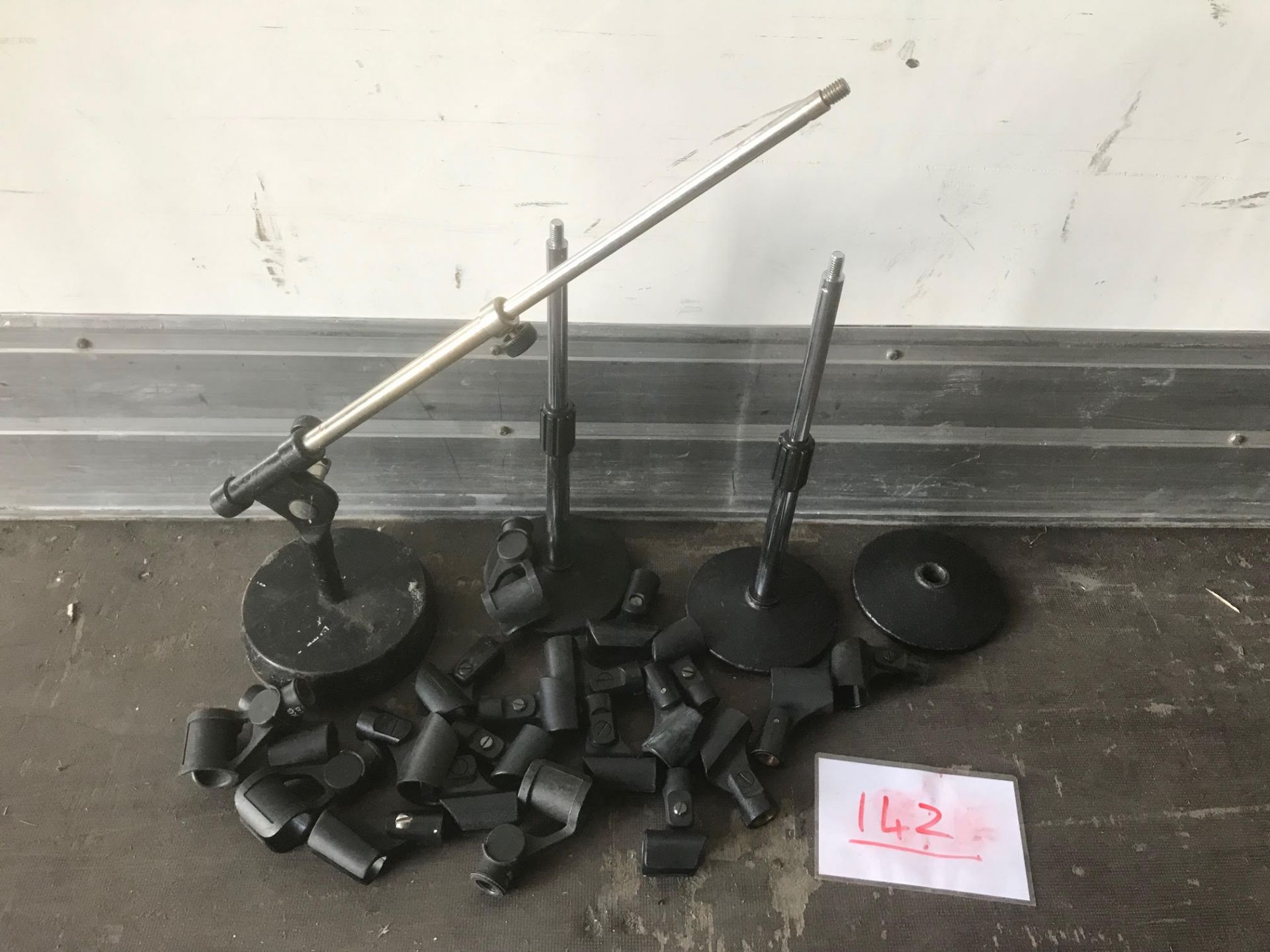 Assorted small mic stands and clips