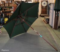 Canvas umbrella on wooden pole