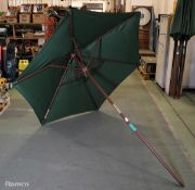 Canvas umbrella on wooden pole