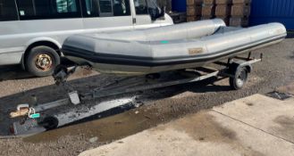 Avon 14ft inflatable boat with transom board on Transcontinental single axle trailer