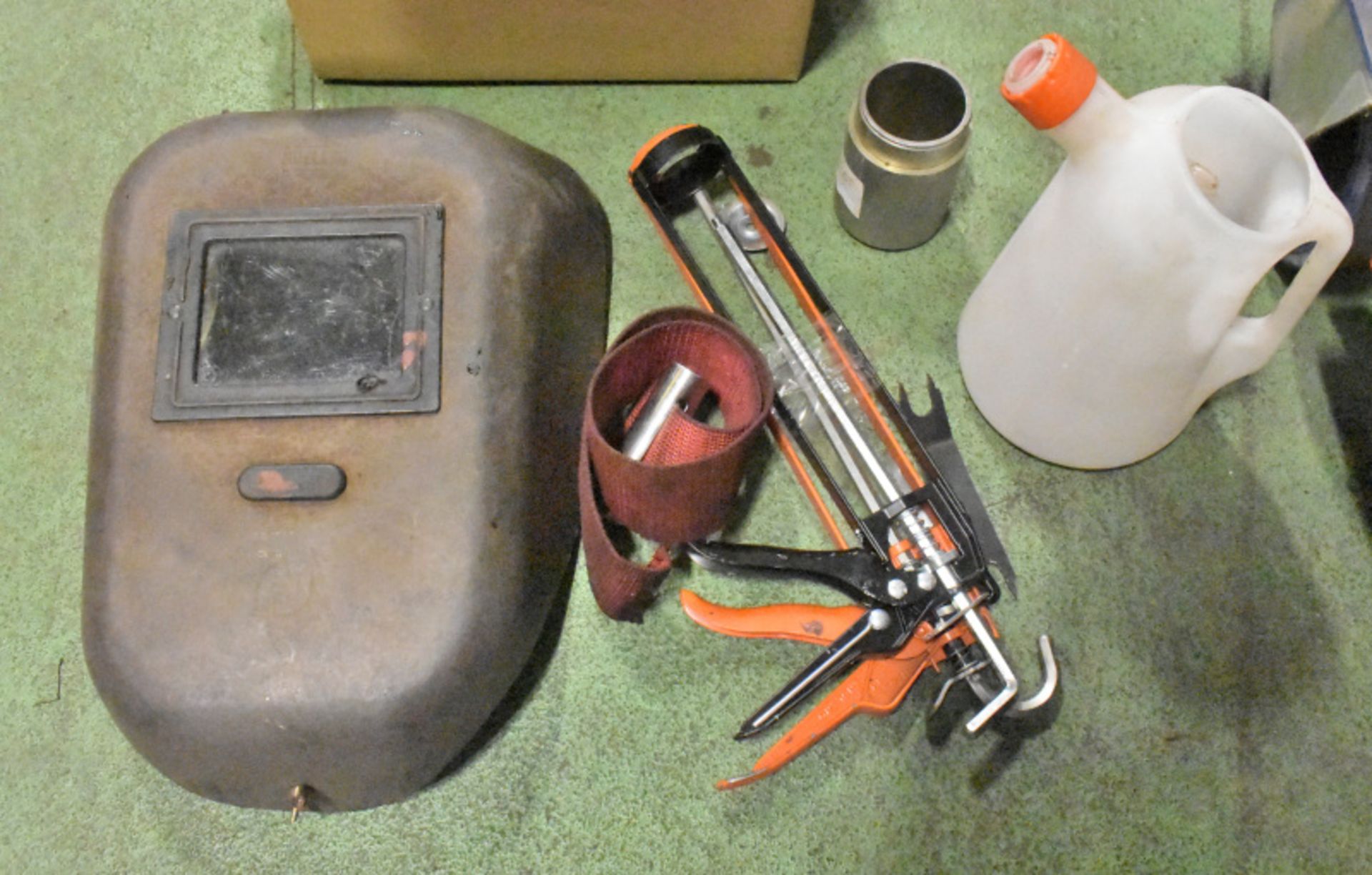 Plastic Oil Jug, Wrench Strap, Mastic Gun