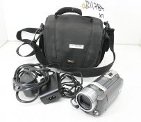 Canon FS11E digital camcorder with case and accessories