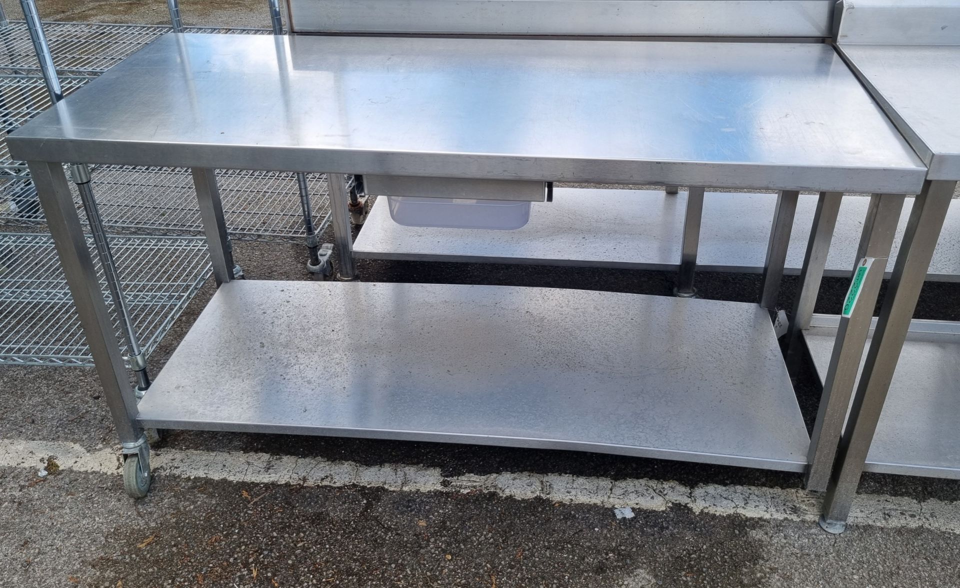 Stainless steel table on wheels - L160 x W65 x H89cm