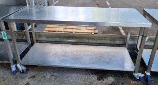 Stainless steel table on wheels - L180 x W65 x H89cm