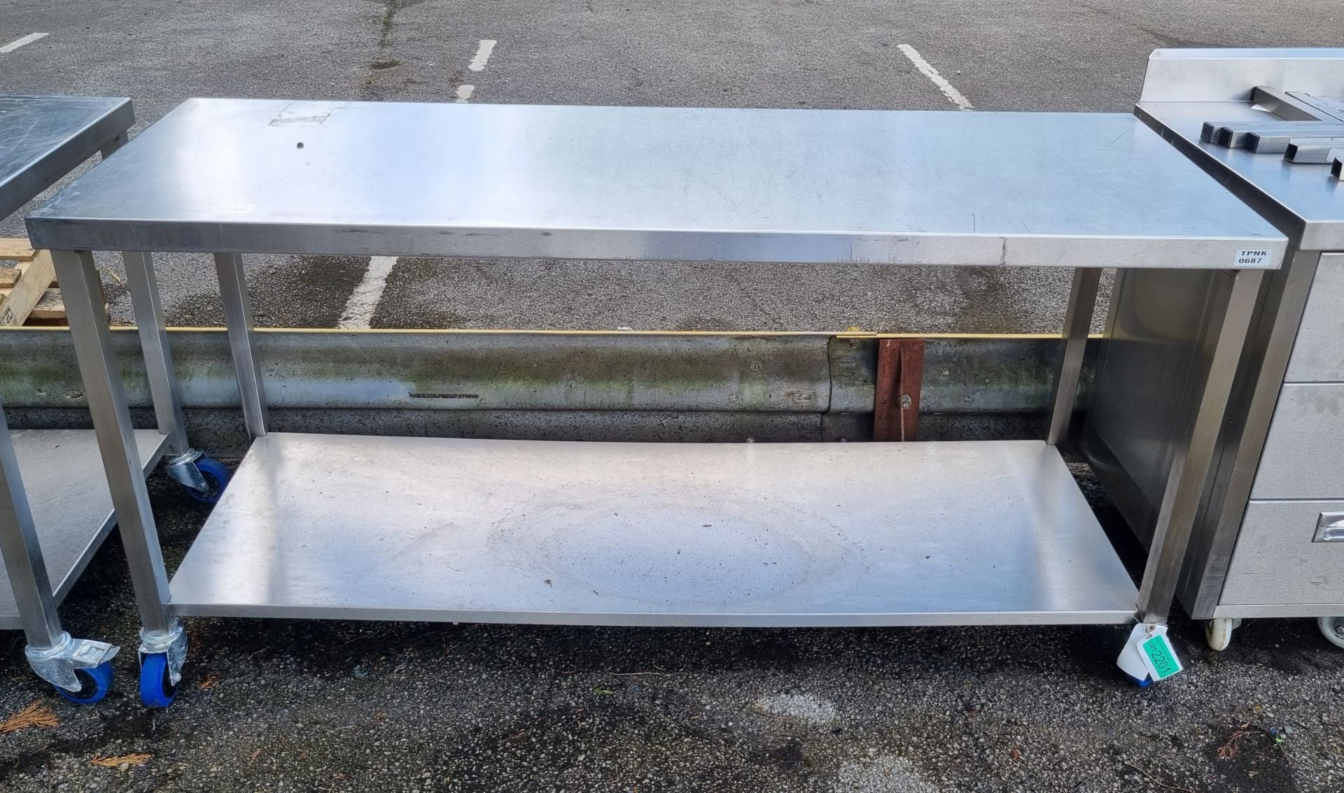 Stainless steel table on wheels - L180 x W65 x H89cm