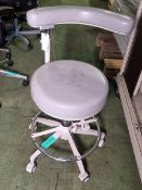 Dental stool with rotating arm